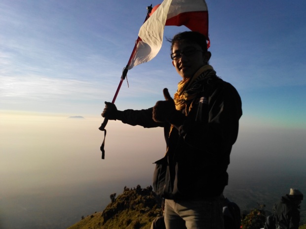 Red & White flag I raised over the clouds on the Mt. Merbabu Peak